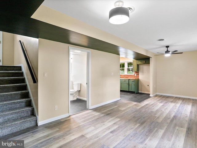 320 Valley View Ave, Keyser, WV 26726 - unfurnished living room with light wood finished floors, stairway, and a ceiling fan