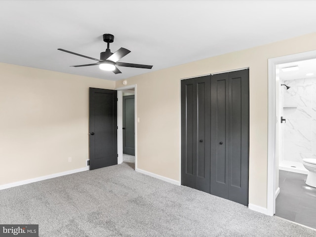 320 Valley View Ave, Keyser, WV 26726 - unfurnished bedroom featuring a closet, carpet floors, ensuite bath, and a ceiling fan