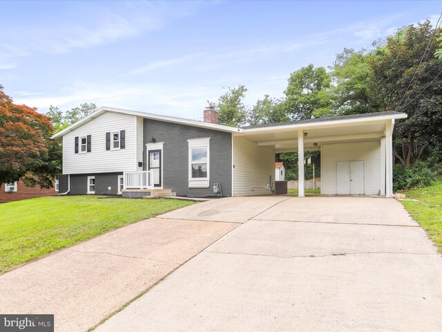 320 Valley View Ave, Keyser, WV 26726 - split level home with a chimney, concrete driveway, a front yard, and an attached carport