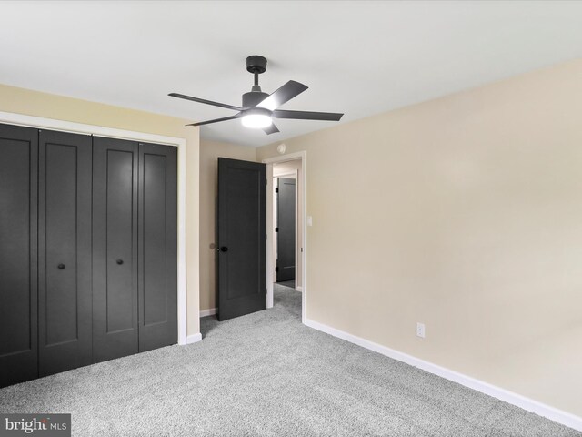 320 Valley View Ave, Keyser, WV 26726 - unfurnished bedroom with carpet floors, a closet, and ceiling fan