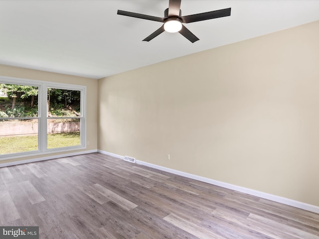 320 Valley View Ave, Keyser, WV 26726 - unfurnished room featuring wood finished floors and ceiling fan