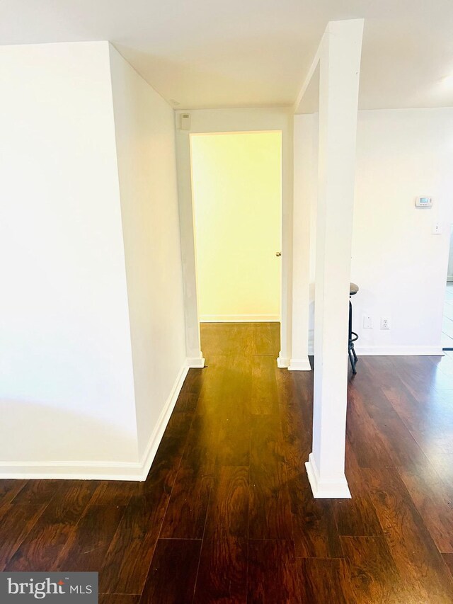 6011 State St, Cheverly, MD 20785 - hall featuring wood finished floors and decorative columns