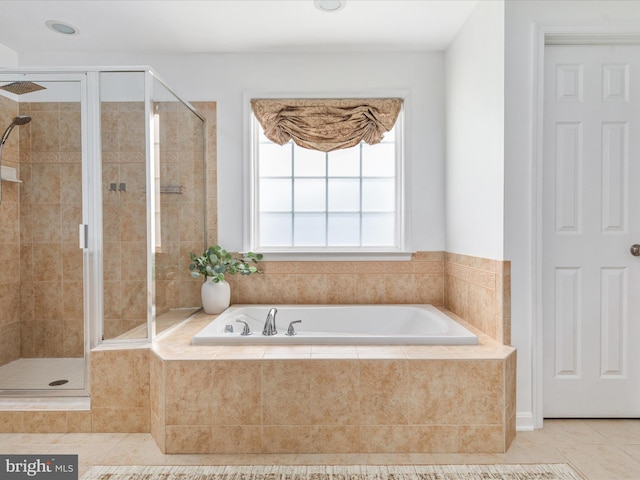 15164 Santander Dr, Gainesville, VA 20155 - bathroom featuring a garden tub, a shower stall, and tile patterned floors