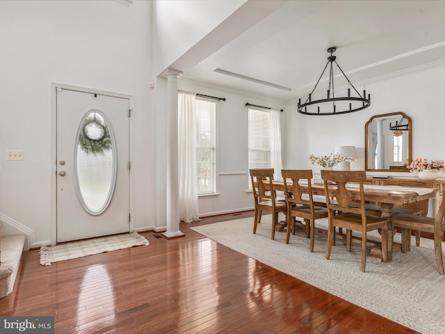 15164 Santander Dr, Gainesville, VA 20155 - dining space featuring ornate columns and hardwood / wood-style floors
