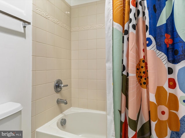 15164 Santander Dr, Gainesville, VA 20155 - bathroom featuring shower / bathtub combination with curtain and toilet