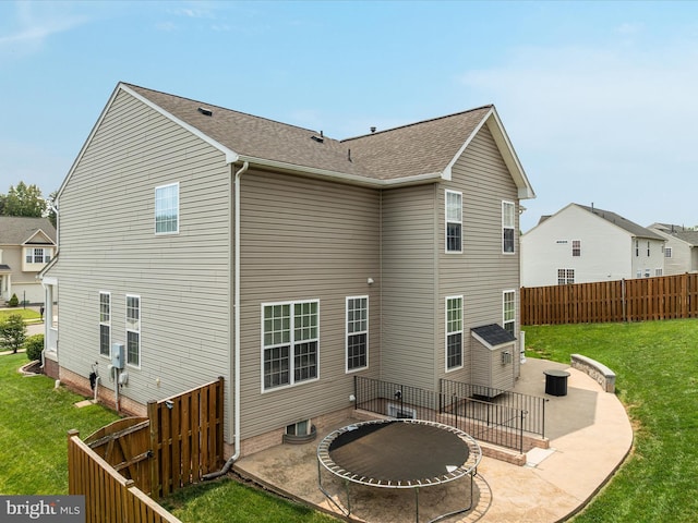 15164 Santander Dr, Gainesville, VA 20155 - back of house with a patio, a fenced backyard, and a shingled roof