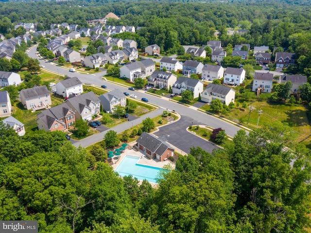 15164 Santander Dr, Gainesville, VA 20155 - aerial view of residential area with a pool area and a heavily wooded area