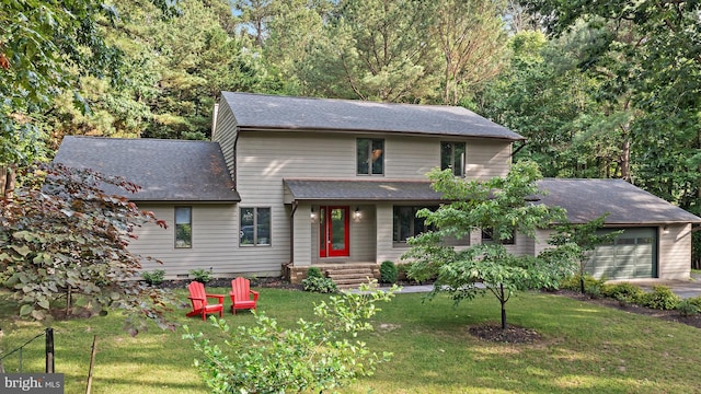 4 Bunkers Ct, Grasonville, MD 21638 - view of front facade featuring an attached garage, a shingled roof, and a front yard