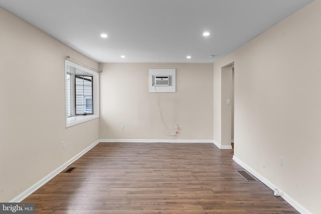 1557 Fairview Ave, Langhorne, PA 19047 - spare room featuring a wall mounted AC, recessed lighting, and dark wood-style floors