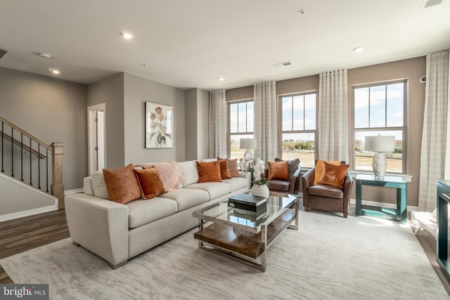 2112 Abboccato Ter SE, Leesburg, VA 20175 - living area with wood finished floors, stairs, and recessed lighting