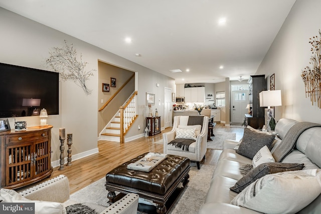 621 Thomas Penn Dr, West Grove, PA 19390 - living room with stairs, recessed lighting, and light wood-style flooring