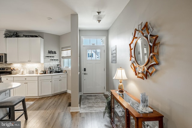 621 Thomas Penn Dr, West Grove, PA 19390 - foyer entrance with light wood finished floors and baseboards