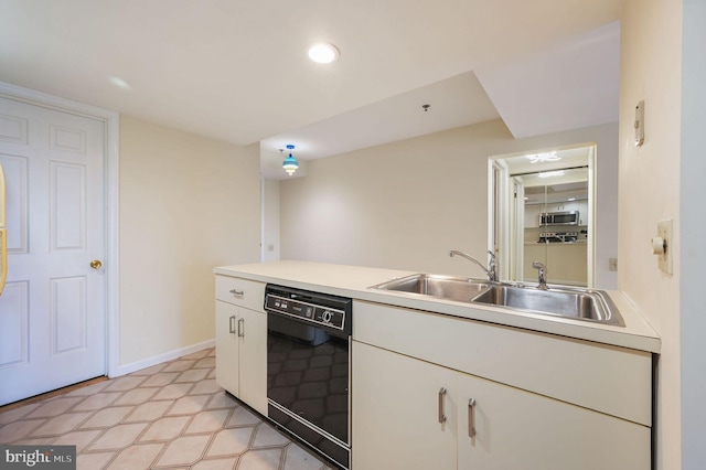 1967 Superfine Ln # 87, Wilmington, DE 19802 - kitchen with black dishwasher, stainless steel microwave, white cabinets, light countertops, and recessed lighting