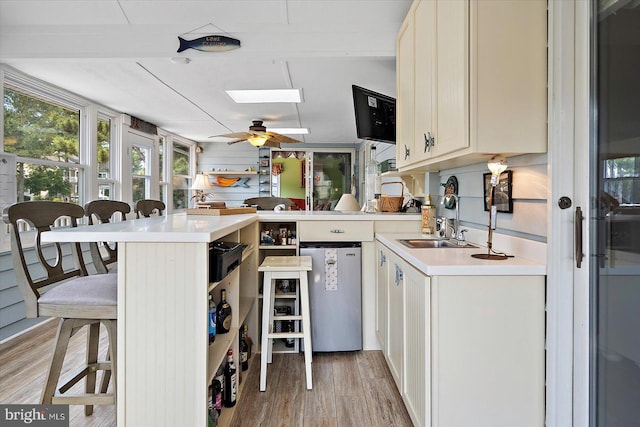 352 Ocean, Ocean Pines, MD 21811 - kitchen with light countertops, stainless steel fridge, light wood-style floors, and healthy amount of natural light