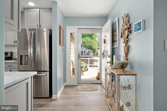 352 Ocean, Ocean Pines, MD 21811 - doorway with light wood-style floors and baseboards