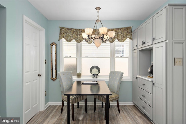 352 Ocean, Ocean Pines, MD 21811 - dining room featuring a chandelier and light wood finished floors