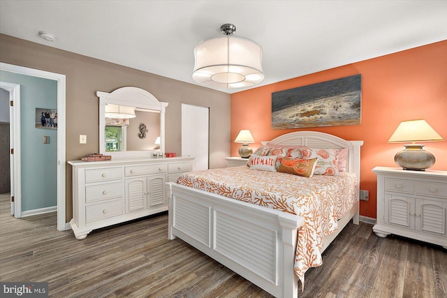352 Ocean, Ocean Pines, MD 21811 - bedroom with dark wood-type flooring and baseboards