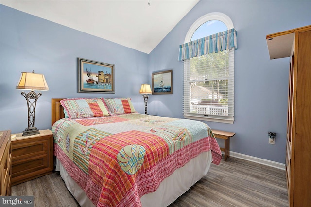352 Ocean, Ocean Pines, MD 21811 - bedroom featuring wood finished floors and high vaulted ceiling