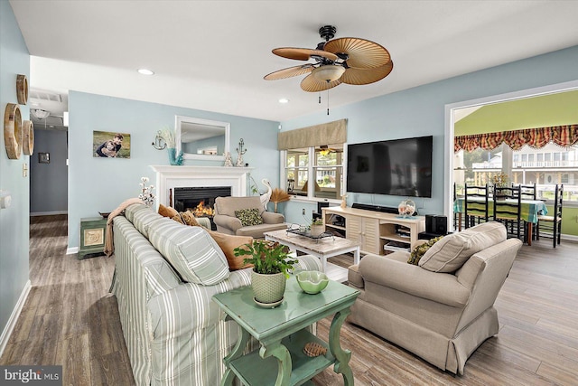 352 Ocean, Ocean Pines, MD 21811 - living room featuring a ceiling fan, a lit fireplace, wood finished floors, and recessed lighting