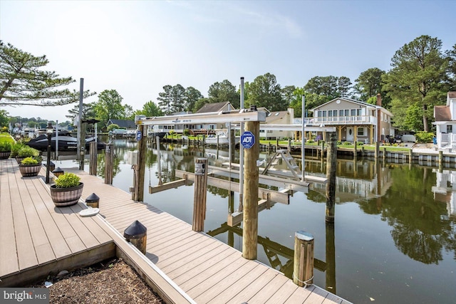 352 Ocean, Ocean Pines, MD 21811 - dock featuring boat lift and a water view