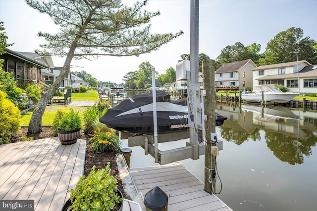 352 Ocean, Ocean Pines, MD 21811 - dock area featuring boat lift, a water view, and a residential view
