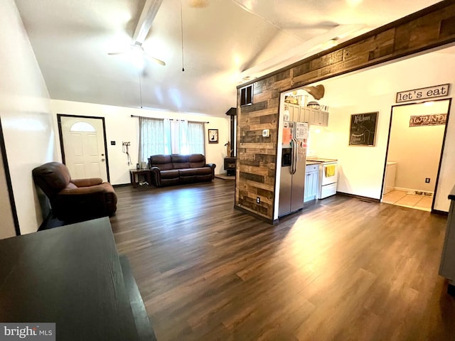 4650 Dywer Ave, Millville, NJ 08332 - living area featuring vaulted ceiling, ceiling fan, and dark wood-style floors