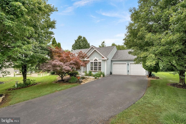 17391 Arrowood Pl, Round Hill, VA 20141 - view of front of property featuring driveway, a garage, and a front yard
