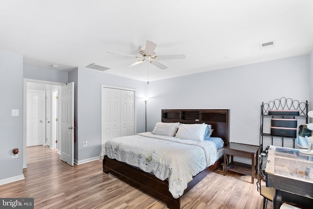 17391 Arrowood Pl, Round Hill, VA 20141 - bedroom with wood finished floors, a closet, and a ceiling fan