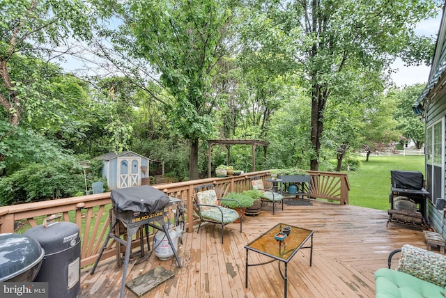 17391 Arrowood Pl, Round Hill, VA 20141 - deck featuring a storage unit, area for grilling, a lawn, and view of scattered trees