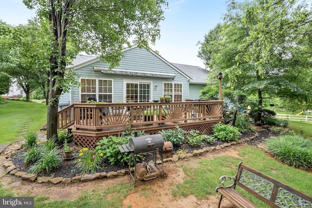 17391 Arrowood Pl, Round Hill, VA 20141 - back of property featuring a deck, a yard, and roof with shingles