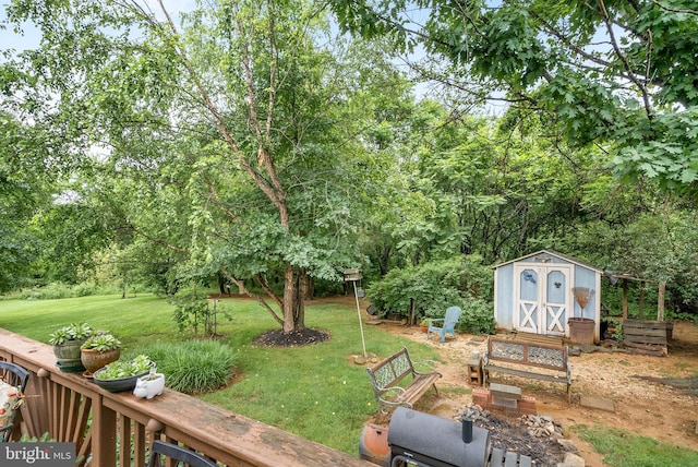 17391 Arrowood Pl, Round Hill, VA 20141 - view of grassy yard with a storage shed and view of scattered trees
