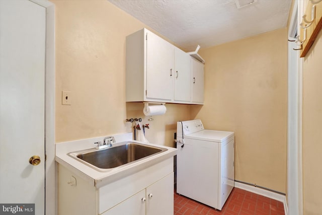 716 Hillcrest Rd, York, PA 17403 - laundry room featuring washer / dryer, cabinet space, and brick patterned flooring