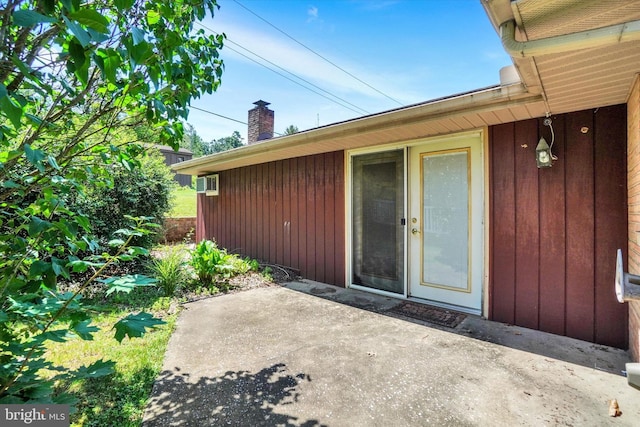 716 Hillcrest Rd, York, PA 17403 - property entrance featuring a patio and a chimney