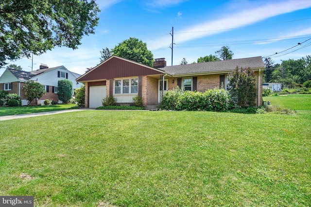 716 Hillcrest Rd, York, PA 17403 - single story home with brick siding, an attached garage, concrete driveway, a chimney, and a front yard