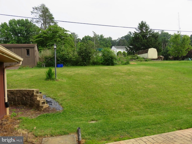 716 Hillcrest Rd, York, PA 17403 - view of green lawn featuring a shed