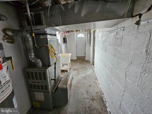 8400 Fayette St, Philadelphia, PA 19150 - unfinished below grade area with gas water heater and heating unit