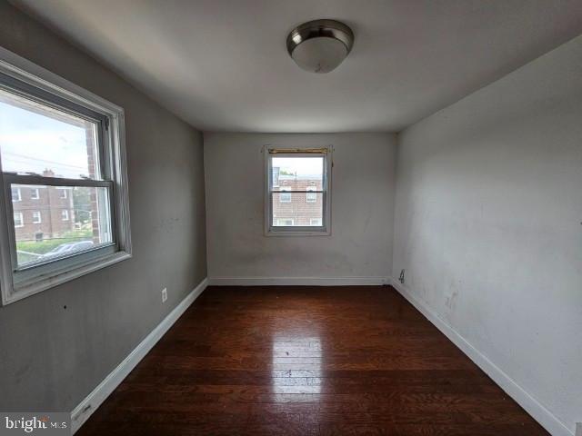 8400 Fayette St, Philadelphia, PA 19150 - spare room featuring wood finished floors and baseboards