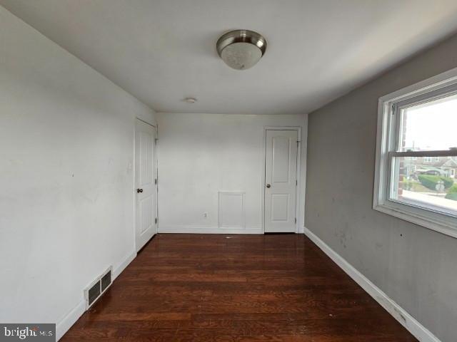 8400 Fayette St, Philadelphia, PA 19150 - spare room with wood finished floors and baseboards