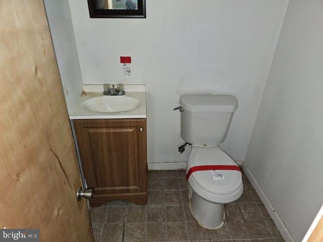 8400 Fayette St, Philadelphia, PA 19150 - half bathroom featuring vanity and tile patterned flooring