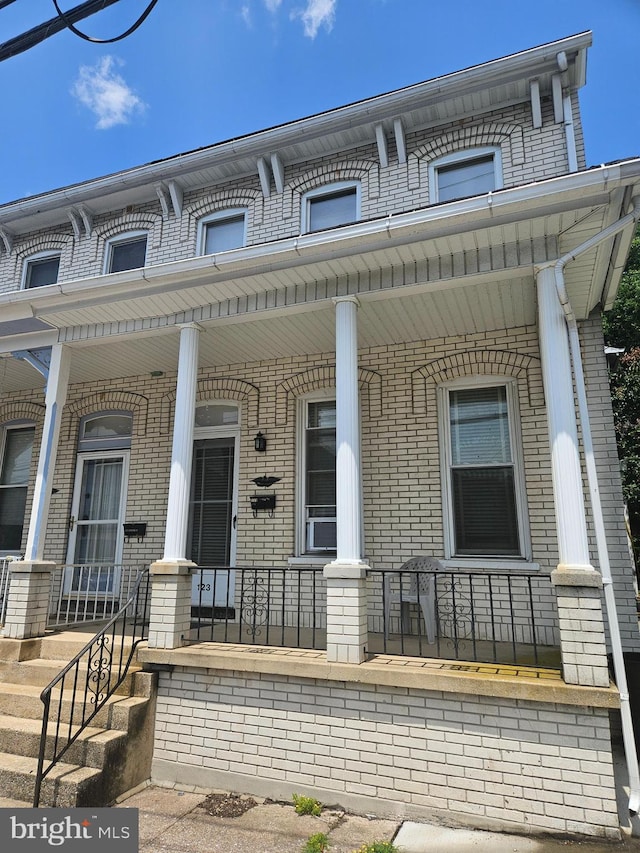 123 E Water St, Middletown, PA 17057 - view of property featuring covered porch and brick siding