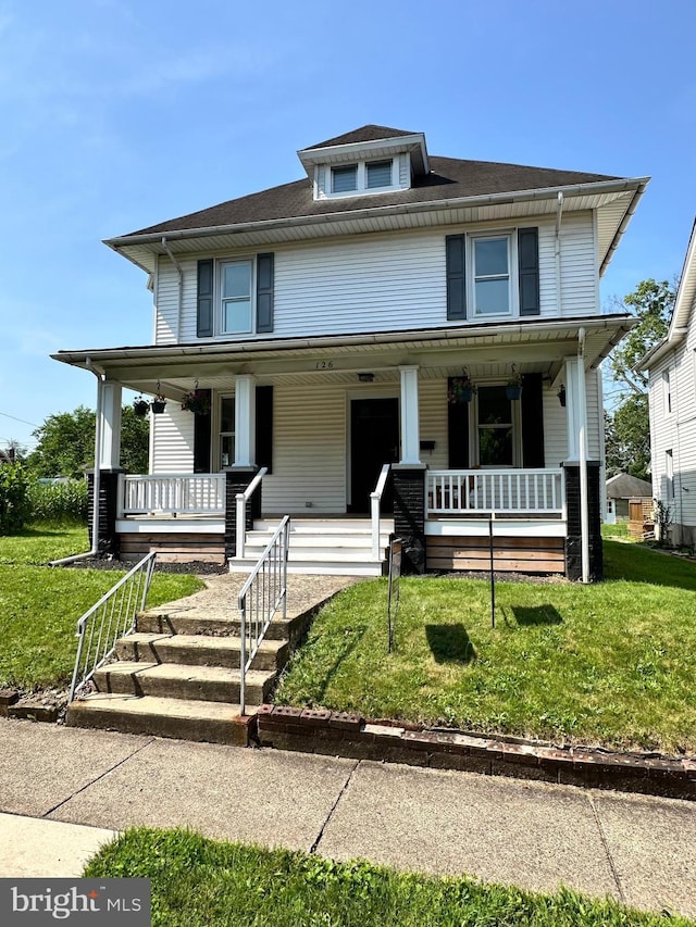 126 E Third St, Lansdale, PA 19446 - traditional style home featuring a porch and a front yard