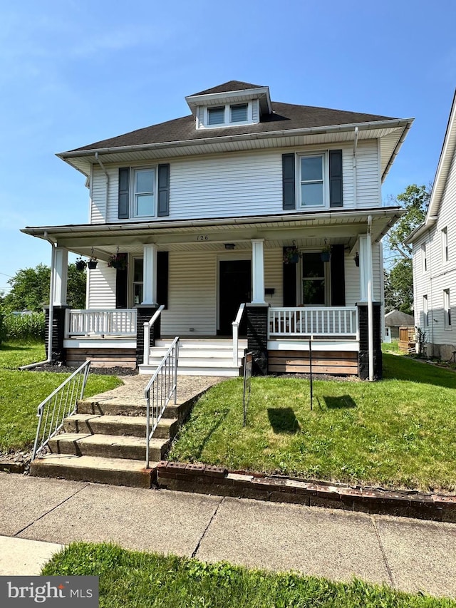 126 E Third St, Lansdale, PA 19446 - american foursquare style home with a porch and a front yard