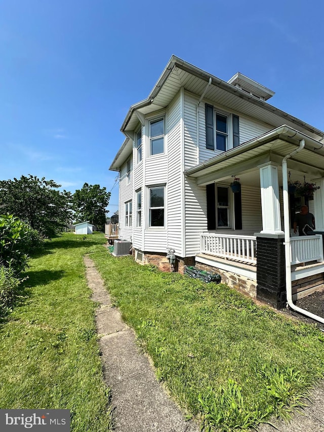 126 E Third St, Lansdale, PA 19446 - view of side of property with covered porch and a yard