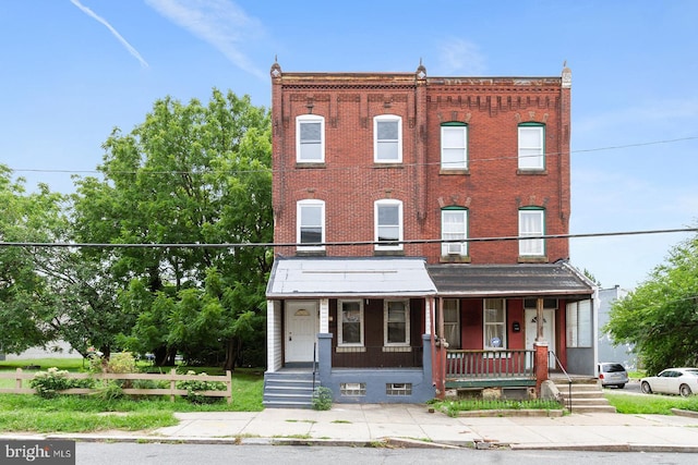 4136 Pennsgrove St, Philadelphia, PA 19104 - view of property featuring covered porch and brick siding