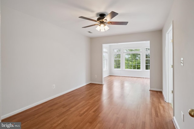 14608 Turara Ct, Haymarket, VA 20169 - spare room with light wood-style flooring and ceiling fan