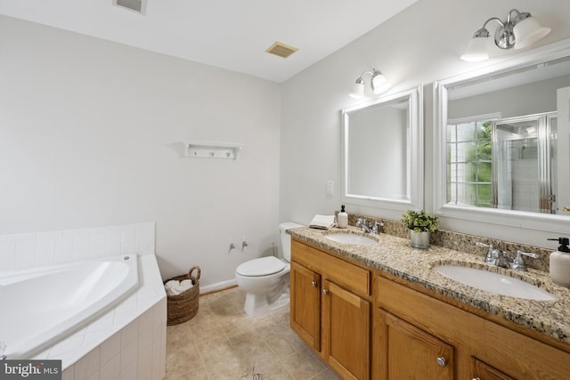 14608 Turara Ct, Haymarket, VA 20169 - full bathroom featuring double vanity, a shower stall, a bath, and tile patterned flooring