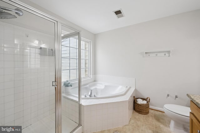 14608 Turara Ct, Haymarket, VA 20169 - full bathroom with tile patterned flooring, a garden tub, a stall shower, and vanity