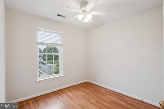 14608 Turara Ct, Haymarket, VA 20169 - empty room with light wood finished floors and a ceiling fan