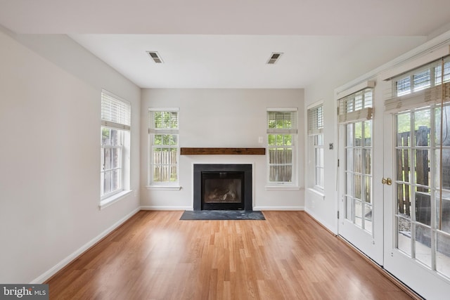 14608 Turara Ct, Haymarket, VA 20169 - unfurnished living room with a fireplace with flush hearth and light wood finished floors