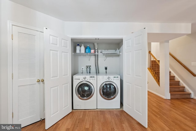 14608 Turara Ct, Haymarket, VA 20169 - laundry area with light wood-type flooring and washer and dryer